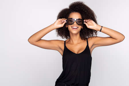 Young woman wearing party eyeglassesの写真素材