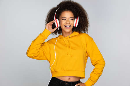 Young woman enjoying musicの写真素材