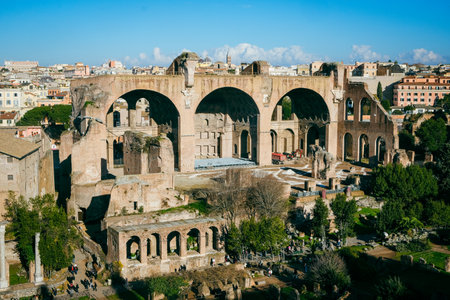 Explore the breathtaking Roman Forum and Palatine Hill, an iconic UNESCO World Heritage site in Rome, Italy. Surrounded by ancient ruins, columns, and Italian pines, it is a top tourist destination near the Colosseumの写真素材