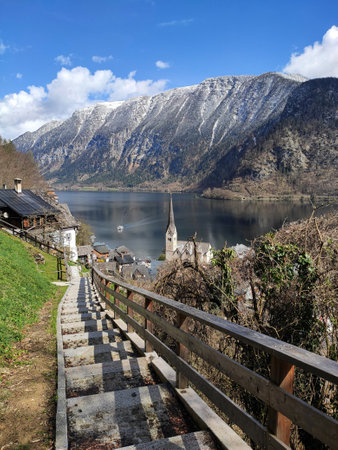 This photo showcases Hallstatt, a charming village in the Austrian Alps, with breathtaking views of the lake and mountains. A must-see destination for travelers.の写真素材