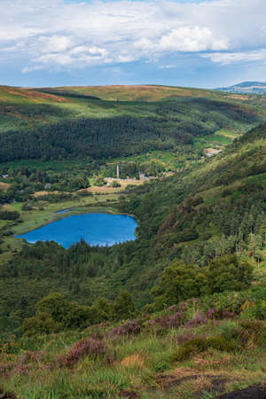  Upper Lake trail on top of the mountain in the valley of Glendalough, Wicklow Mountains, Ireland. Summer day.の写真素材