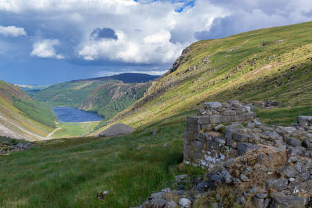 Upper Lake trail on top of the mountain in the valley of Glendalough, Wicklow Mountains, Ireland. Summer day.の写真素材