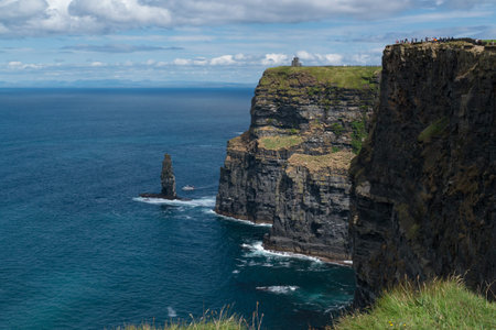 View of the world famous Cliffs of Moher in county Clare Ireland. Scenic Irish nature landmark along...
