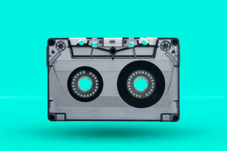 Old tape cassette on blue backgroundの写真素材
