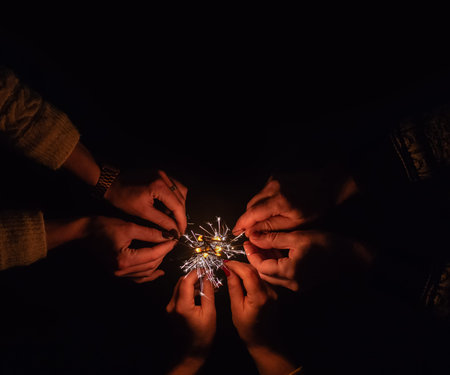 Flames of Bengal fire. Burning sparklers in hands.