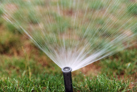 Sprinkler for automatic watering during lawn moisteningの写真素材