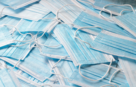 Medical surgical face masks background. Coronavirus pandemic concept.の写真素材