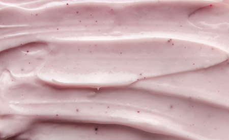 Smears of pink cosmetic cream. Beauty cream texture background.の写真素材