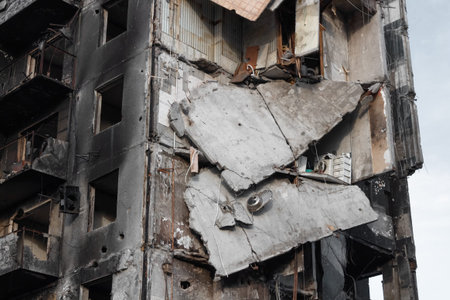 A high-rise building was completely destroyed as a result of a direct missile hit. Military crime of...