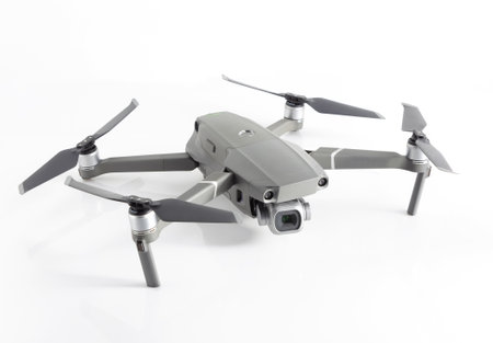 Aerial drone on white Background. Remote controled quadrocopter.の写真素材