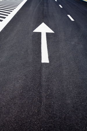 Arrow sign as road markings on a streetの写真素材