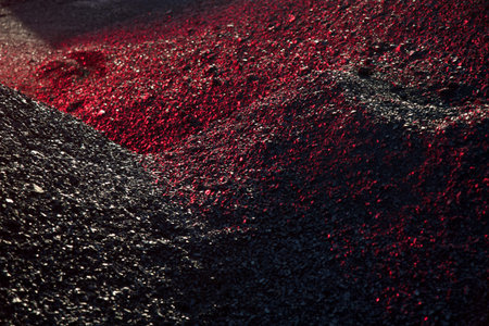 Heaps of coal in the red light