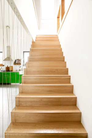 Wooden stairs in modern houseの写真素材