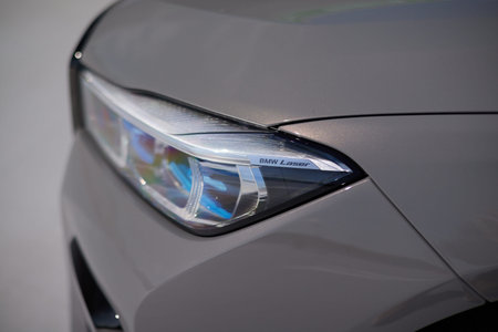 Laser headlamp in gray BMW 7 series. Side view. Close up. Katowice, Poland, June 12, 2021