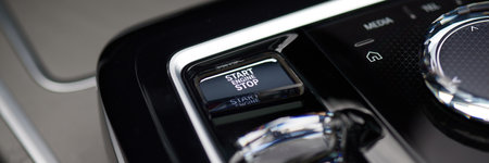 BMW 7 Series, G70, and modern premium limousine. Center console with crystal gear selector switch and function knob. On sale from 2023. Poland, Katowice 03/05/2023のeditorial素材