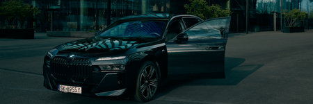 BMW 7 Series, G70, and modern premium limousine. The car on the background of the office building. On sale from 2023. Poland, Katowice 03/05/2023のeditorial素材