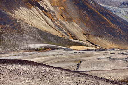 Iceland. Breathtaking views of SnÃ¦fellsjÃ¶kull reveal unique volcanic landscape with earthy tones, dramatic slopes, and varied textures, representing the powerful forces of nature in Icelandの写真素材