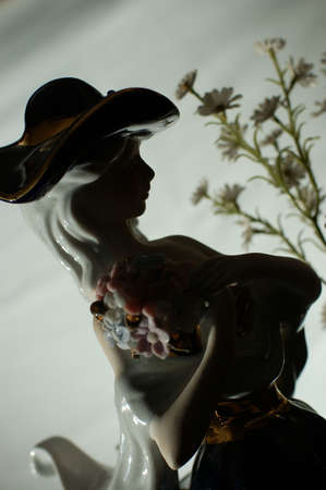 Female statue art under low lightの写真素材