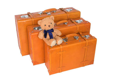 leather suitcases and teddy bearの写真素材