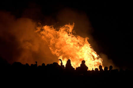 silhouettes of people over bonfire, Spainの写真素材