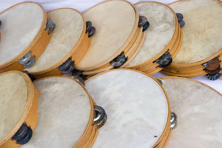 pile of tambourines to be soldの写真素材