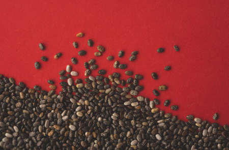 Chia seeds Macro photography with red backgroundの写真素材