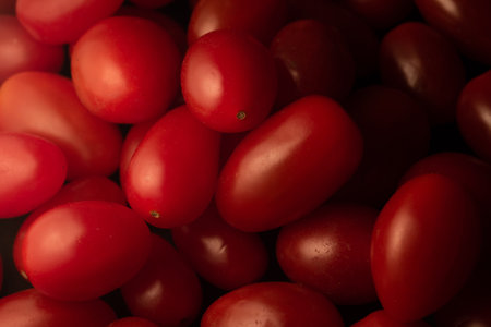 Grape / cherry red tomato macro close up, selective focus