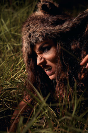 portrait girl werewolf. background forest. cosplayの写真素材