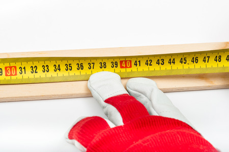 Measure with tape and markの写真素材