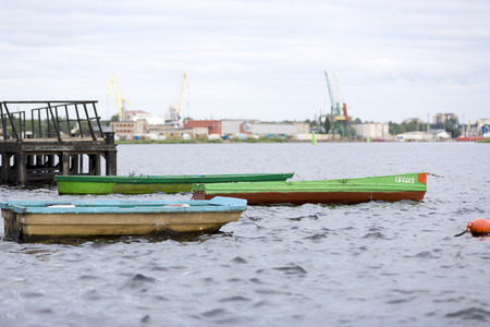 Colorful fishing boats at pierの写真素材
