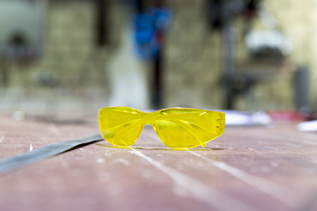 Protective goggles in workshopの写真素材