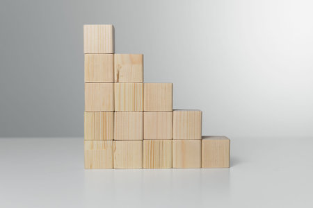 Concept of growth in business,stack of wooden block
