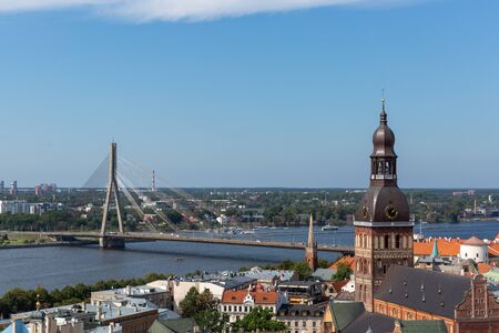 View of Old Town and river Daugava from Saint Peter church, Riga, Latviaの写真素材
