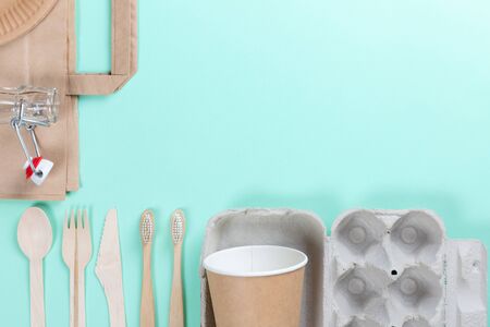Sustainable eco friendly concept. Kitchenware on a teal background.の写真素材