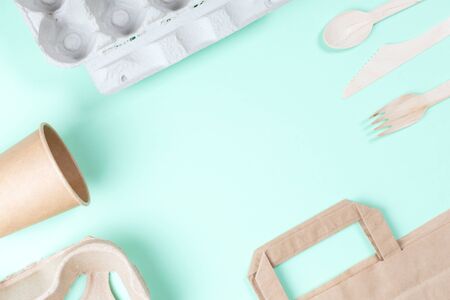 Sustainable eco friendly concept. Kitchenware on a teal background.の写真素材