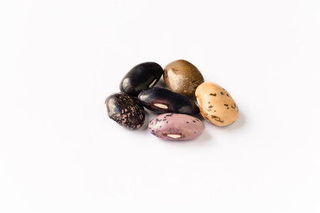 Beans close-up on a white background, insulators. Healthy food, bean. Protein protein