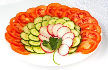 chopped vegetables on a white backgroundの写真素材