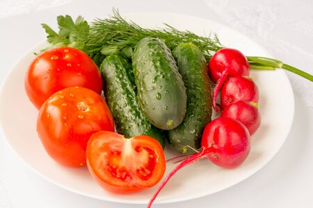 Green ripe vegetables on a white backgroundの写真素材
