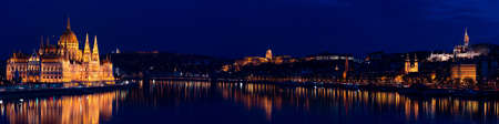 Night Budapest, Parliament against the background of the night city, reflection of lights in the river, panorama of the cityの写真素材