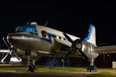 Small plane at the airport against the background of the night sky.の写真素材