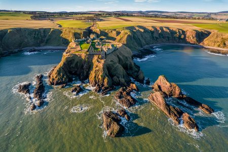 Dunnottar medieval castle located on the east coast of Scotlandの写真素材