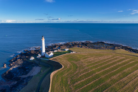 Lighthouse on the coast of the North Sea in Scotland, view from aboveの写真素材