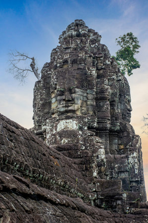 Ancient Bayon temple complex in the center of Angkor Thom in Cambodia.の写真素材