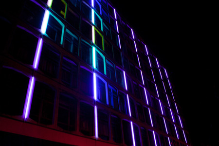 Illuminated building at night with fancy lightsの写真素材