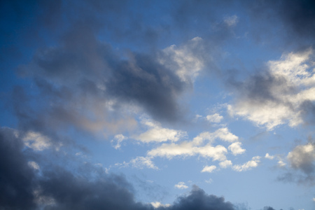 beautiful clouds on the sky with blue and white patches with copy space for textの写真素材