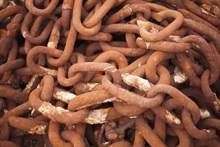 Rows of rusted chains as a backgroundの写真素材
