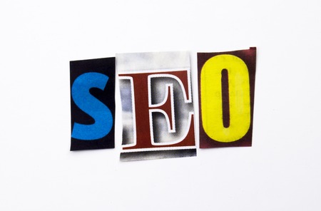A word writing text showing concept of SEO made of different magazine newspaper letter for Business case on the white background with spaceの写真素材