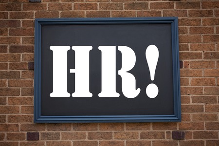 Conceptual hand writing text caption showing announcement HR Human resource. Business concept for  Personnel Staff Forces written on frame old brick background with spaceの写真素材