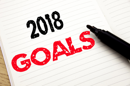 2018 Goals. Business concept for financial planning, business strategy written on notebook with space on book background with marker penの写真素材