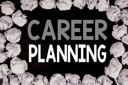 Word, writing Career Planning. Business concept for Business Growth Goal Setting written on black background with copy space on background with folded paper ballsの写真素材